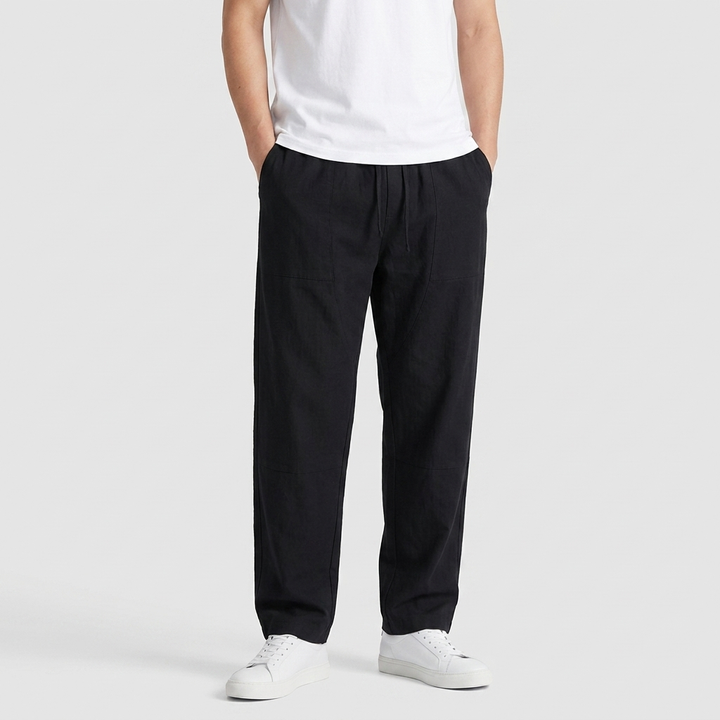 Mens black relaxed fit trousers with straight leg design and side pockets