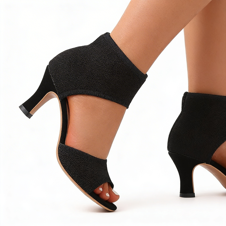 Womens black open toe heels with ankle cuff design and textured knit upper