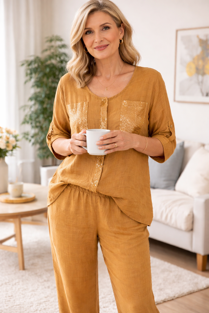 Womens button front lounge set featuring a long sleeve top with decorative pocket details and matching relaxed fit trousers
