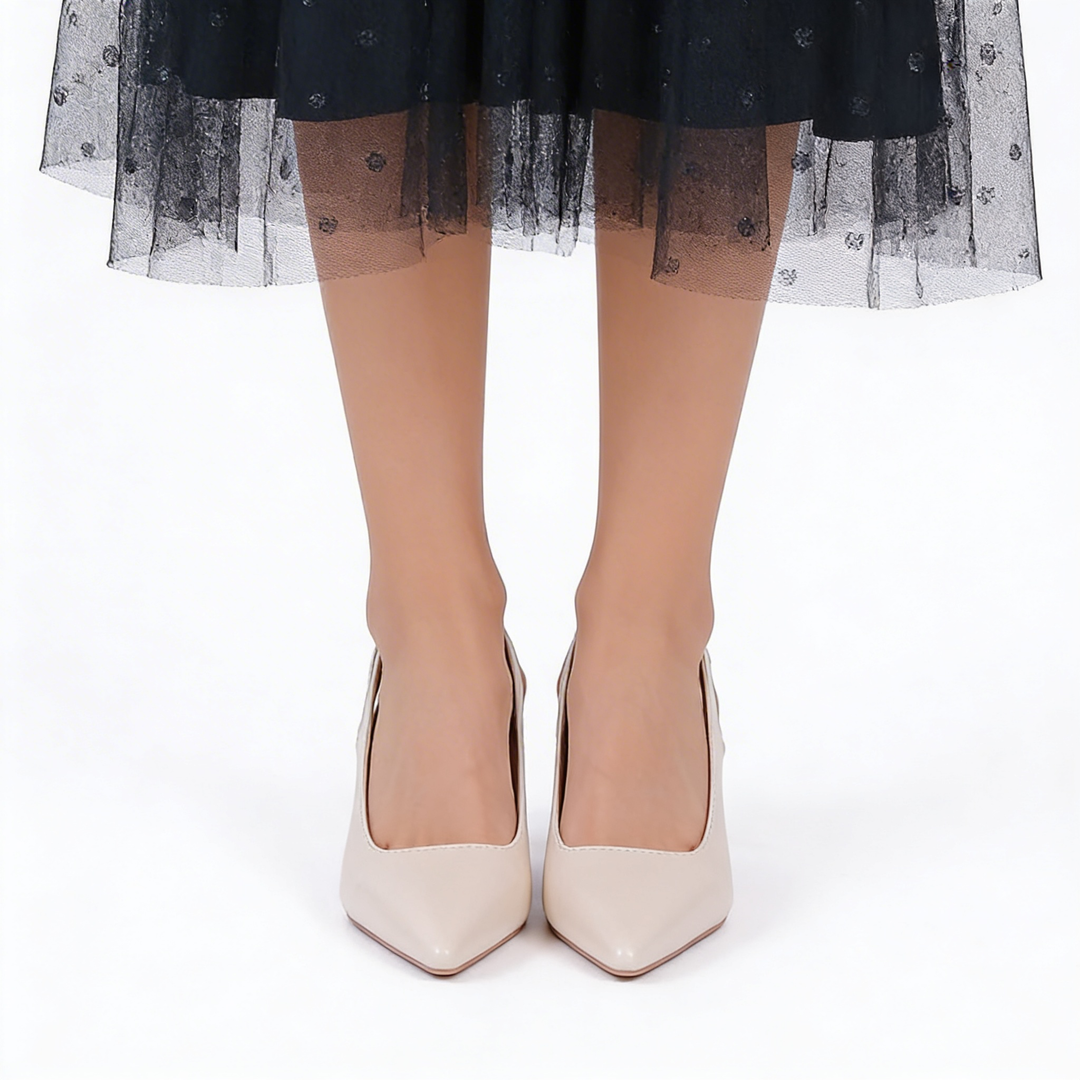 Womens ivory pointed toe heels with slingback strap and mid heel design