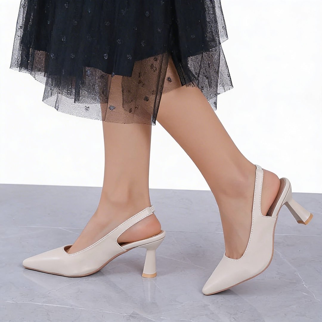 Womens ivory slingback heels with pointed toe and mid heel design