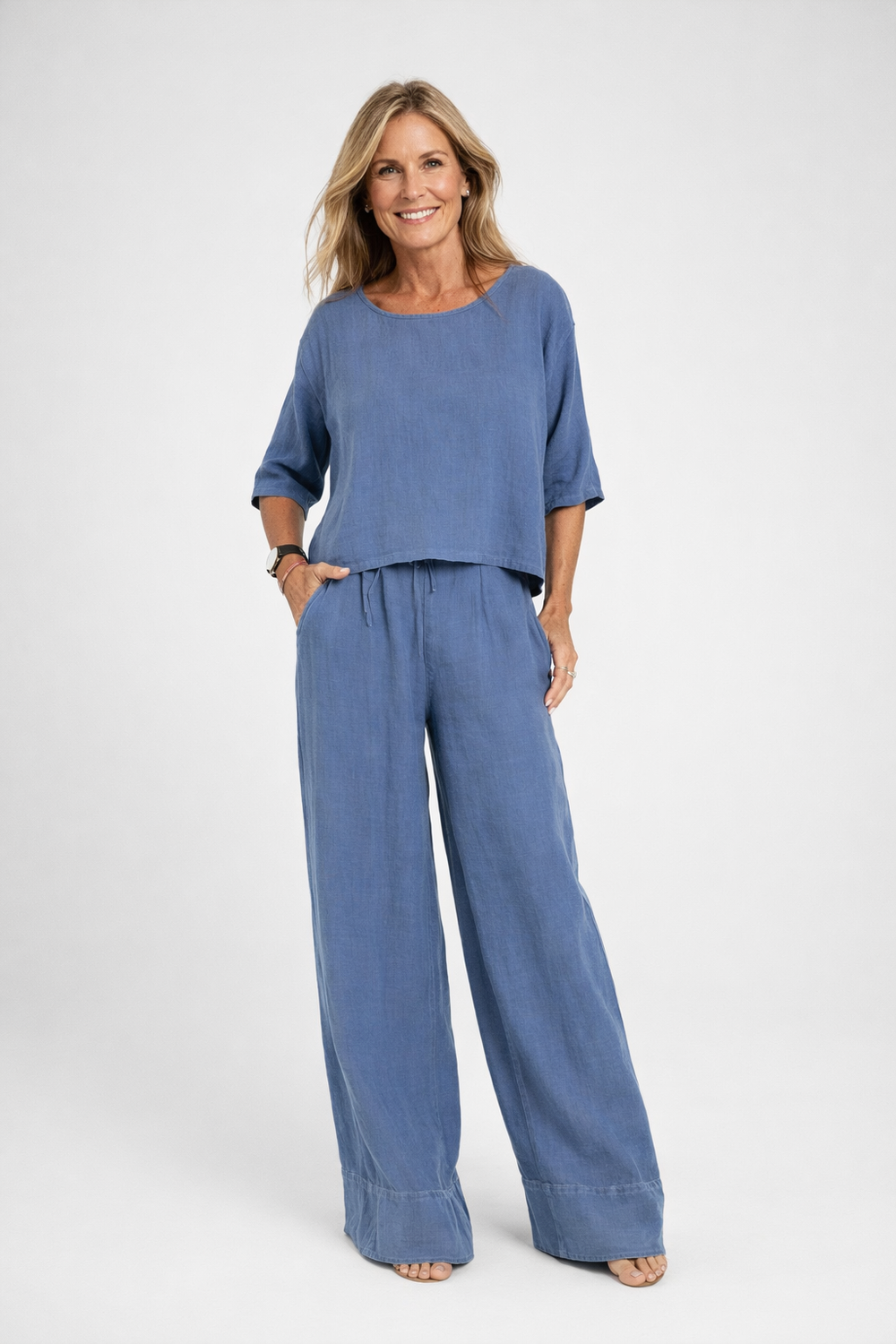 Womens relaxed two piece set featuring a short sleeve loose fit top and matching wide leg drawstring trousers