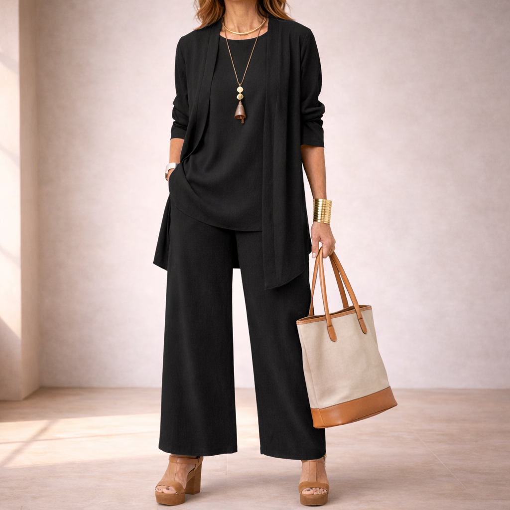 Womens three piece lounge set featuring an open front cardigan, sleeveless top and wide leg trousers in a coordinated relaxed silhouette