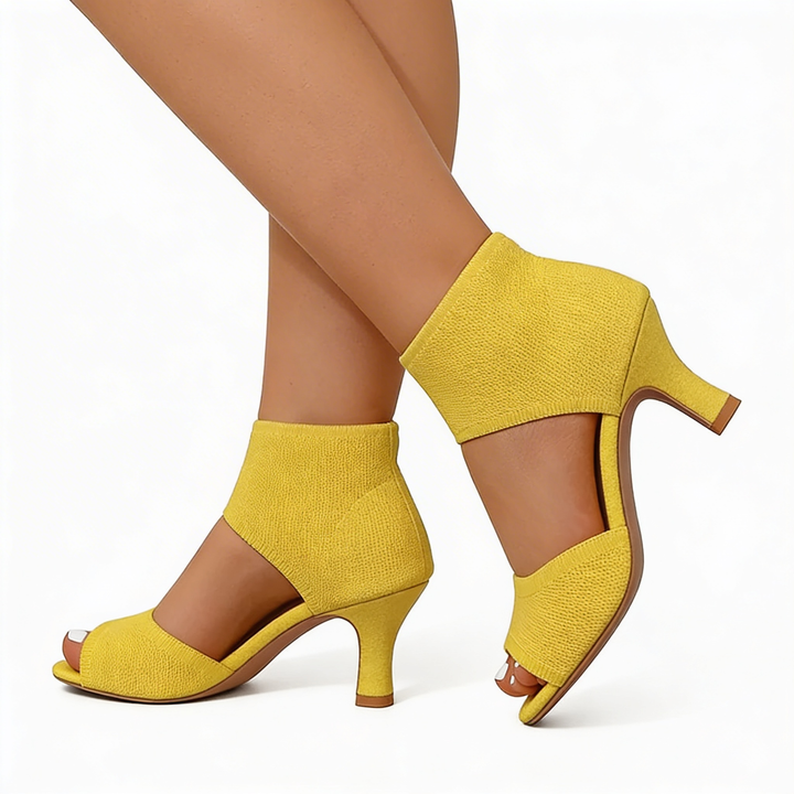Womens yellow open toe heels with ankle cuff design and textured knit upper